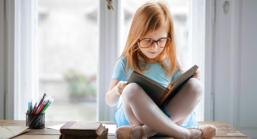 Child reading a book