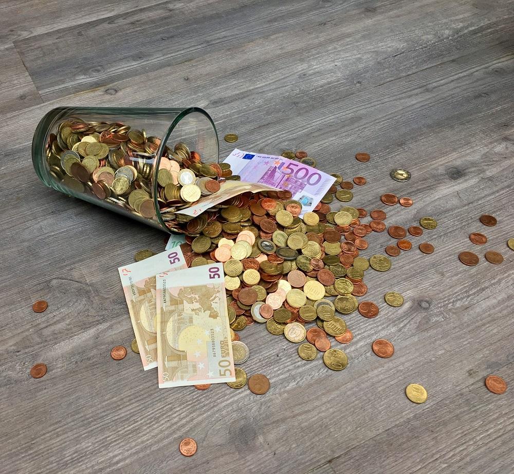 Glass with money 
