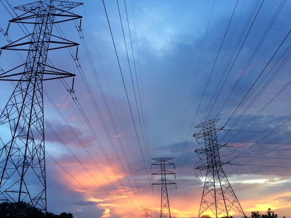 Electricity pylons at sunset
